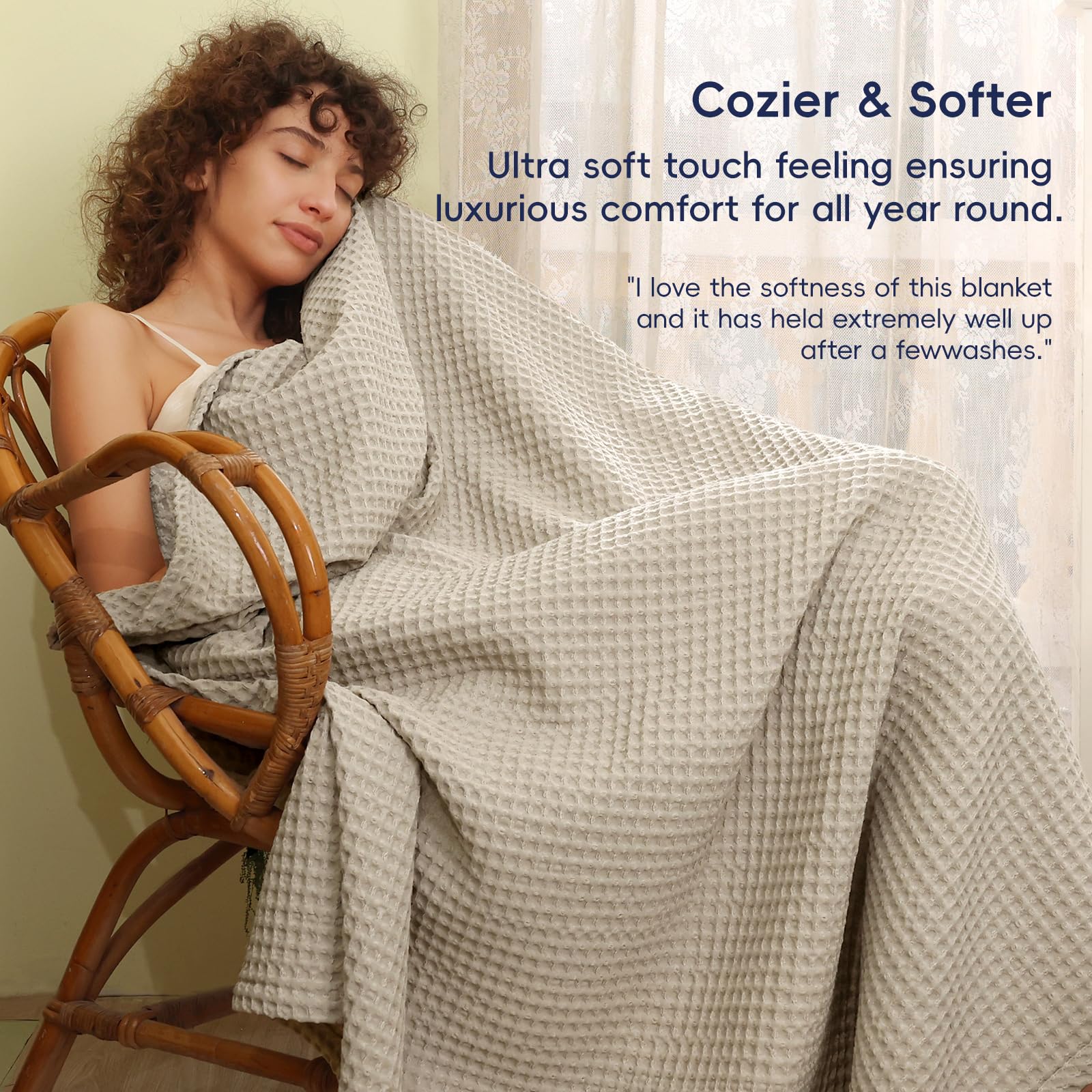 PHF blanket draped on bed highlighting layered styling and breathable warmth