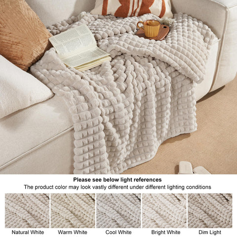 PHF blanket with pet curled up showing pet-friendly softness and easy maintenance