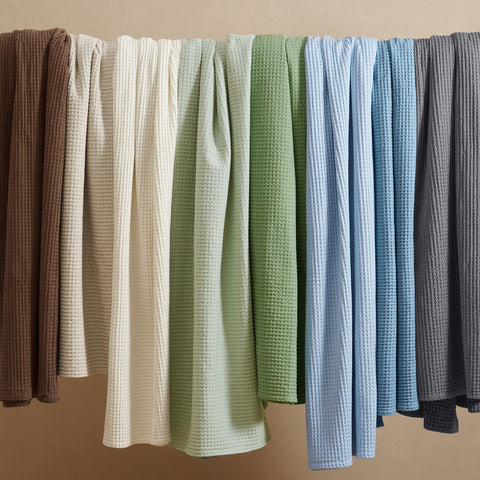 PHF blanket used as sofa throw adding textured style to living room