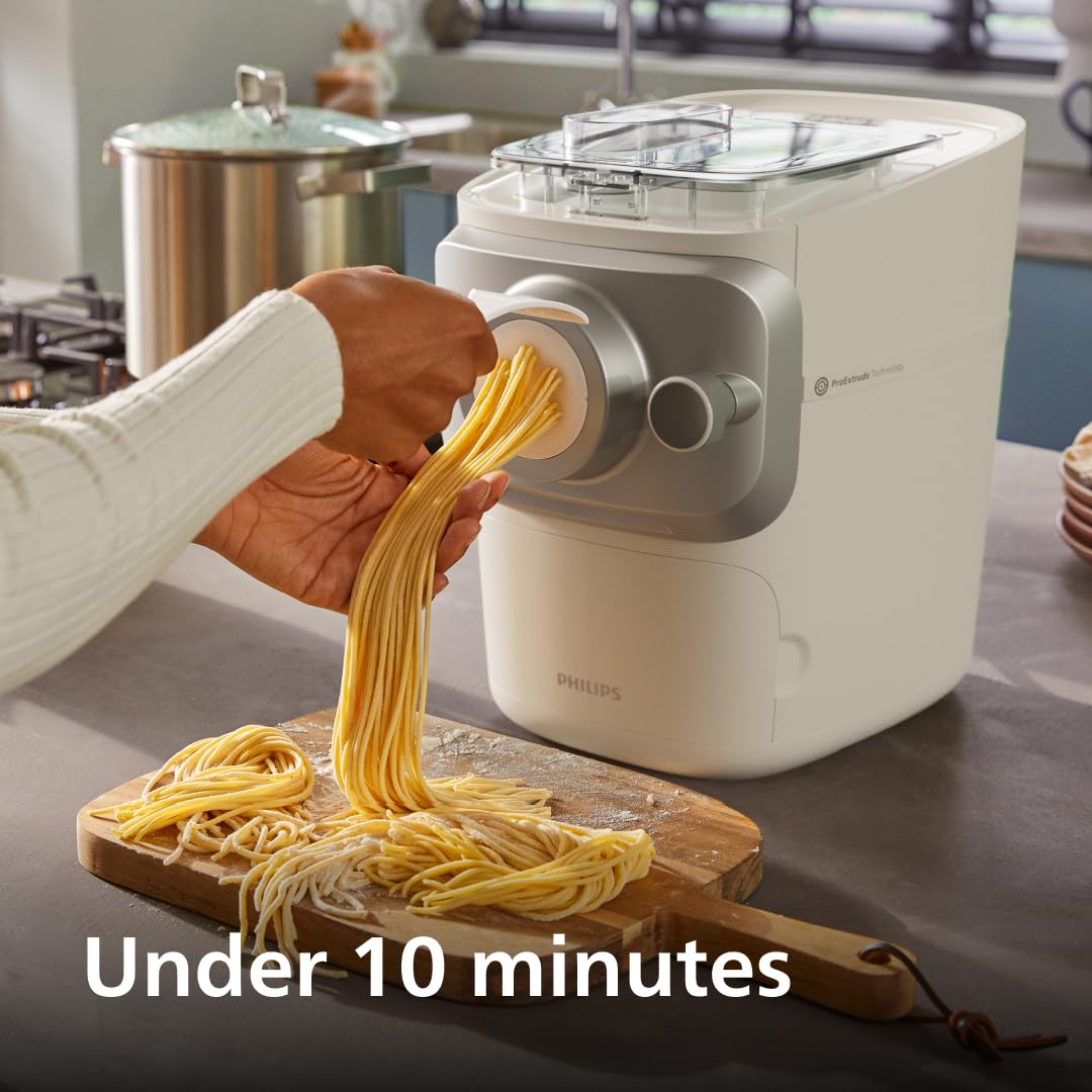 Philips 7000 extruding spaghetti close-up demonstrating consistent strands for reliable cooking results