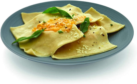 Philips lifestyle shot of plated pasta showing homemade results and dining presentation benefit