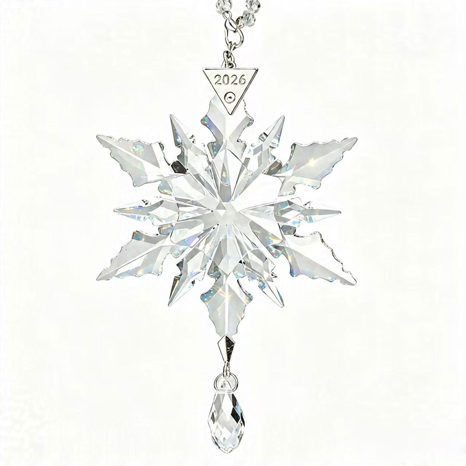 PHIMAS ornament hanging on Christmas tree creating bright reflective accents