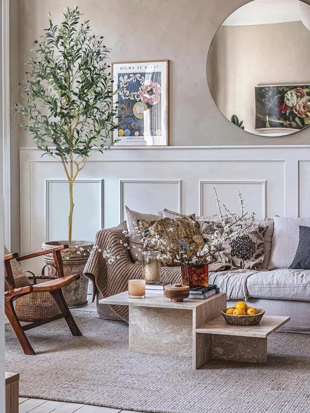 Phimos styled in living room adding greenery and visual height to décor