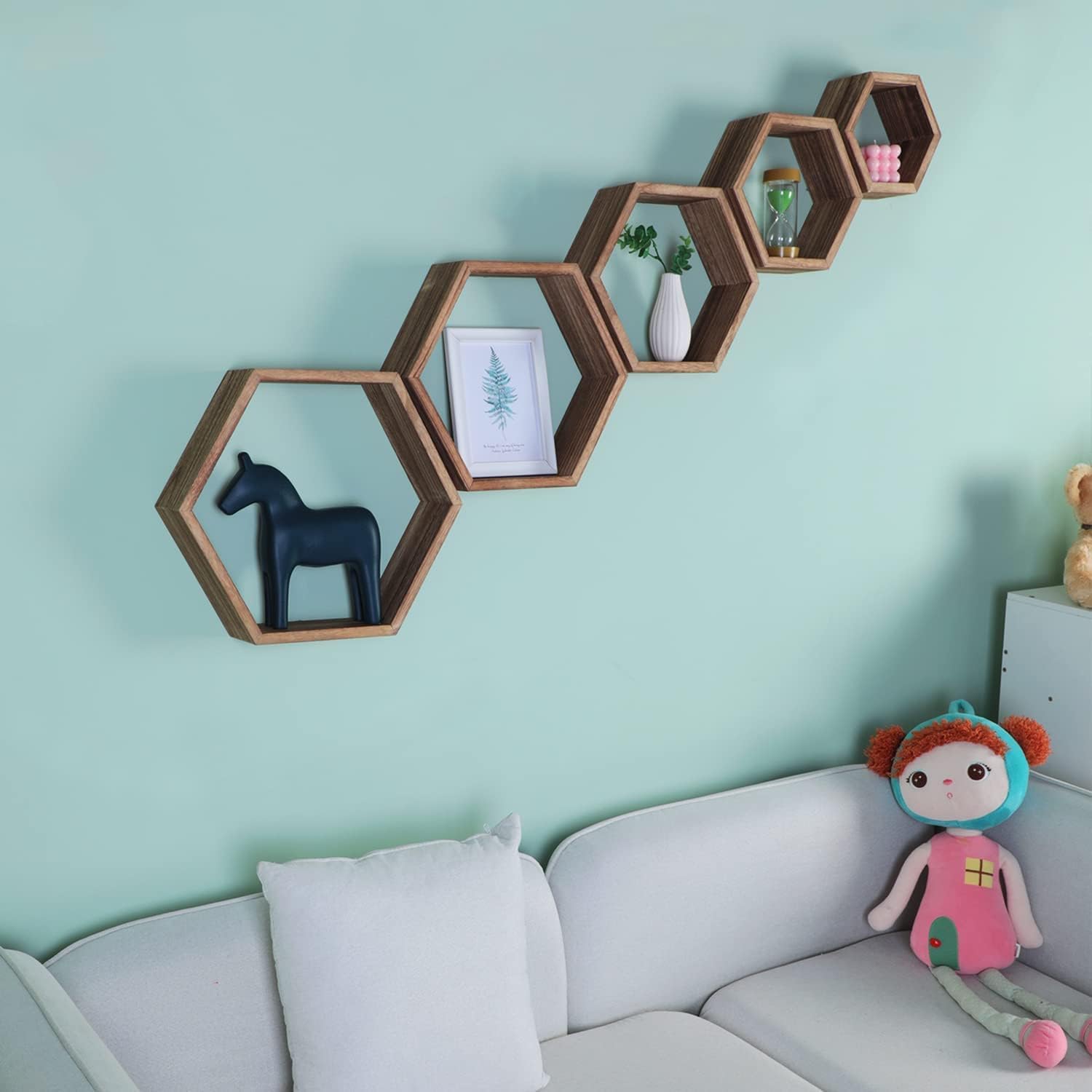 PHOENANCEE hexagon shelf holding books to show size and strength
