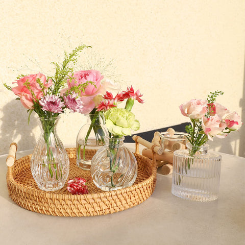 PHUNTTEK vase held in hand to show small scale and tabletop fit
