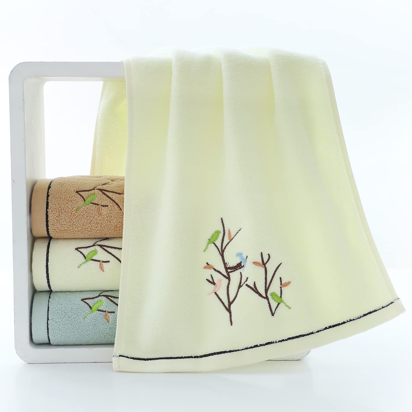 Pidada close-up of embroidered bird and tree detail, highlights attractive embroidered accent