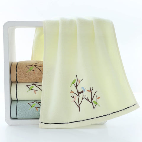 Pidada close-up of embroidered bird and tree detail, highlights attractive embroidered accent