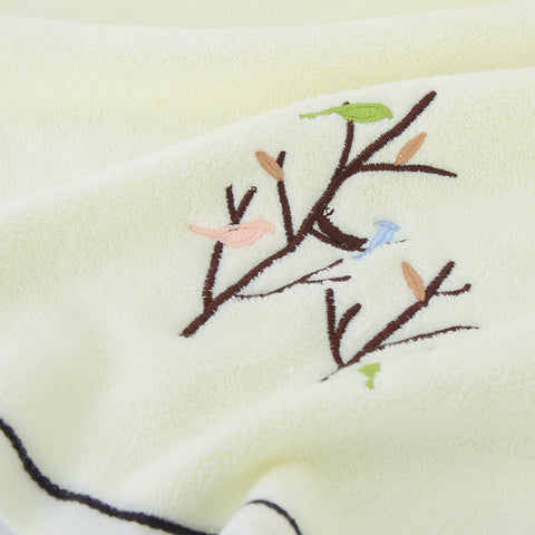 Pidada care label close-up showing machine wash instructions to protect towel longevity