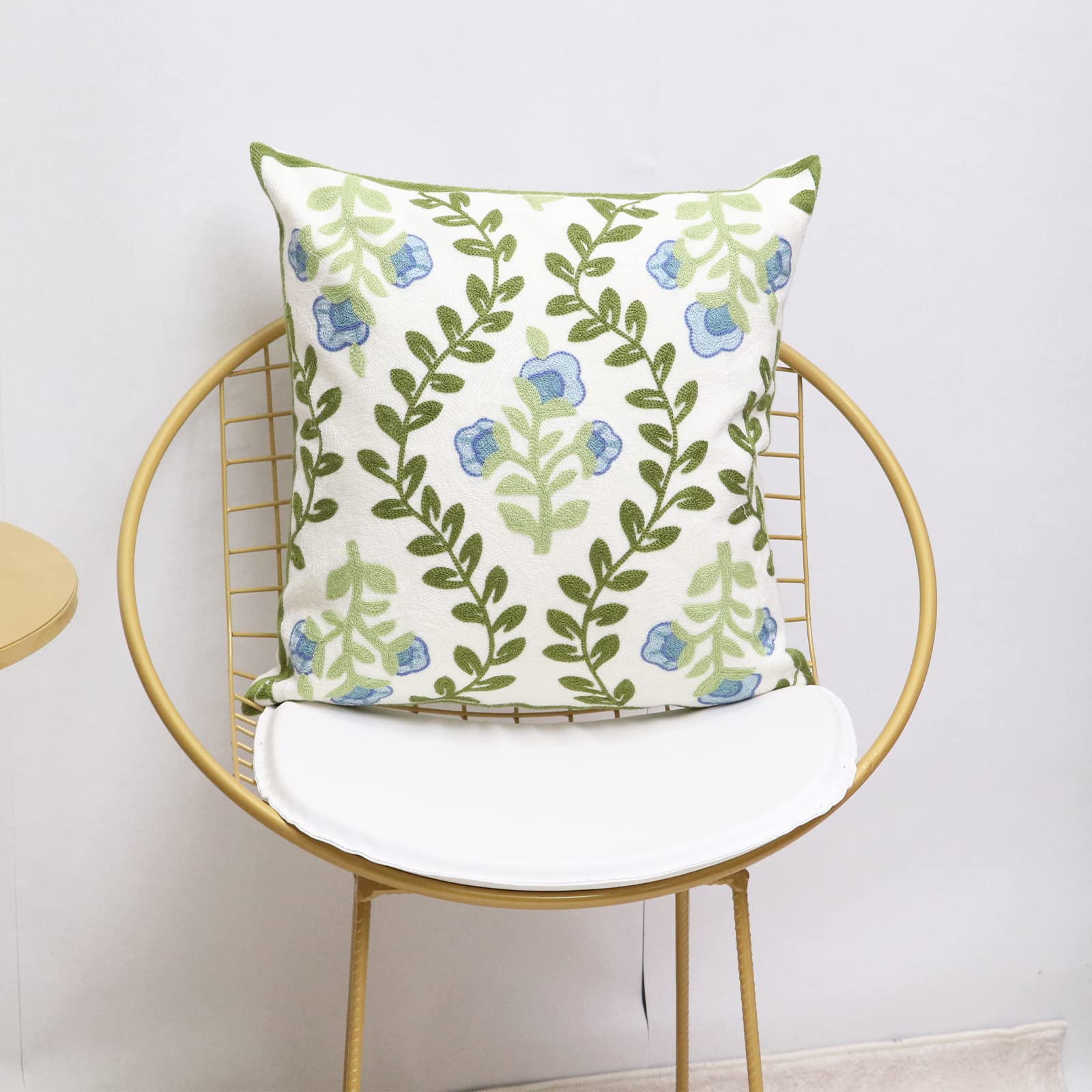 Pilmandu pair styled on sofa adding farmhouse charm and comfort