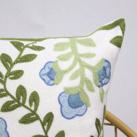 Pilmandu styling with throws and plants demonstrating layered decor