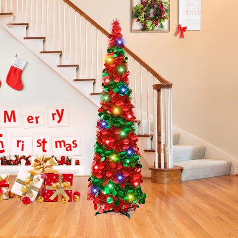 Pinkswan lit tree in living room showing battery LED lights creating festive atmosphere