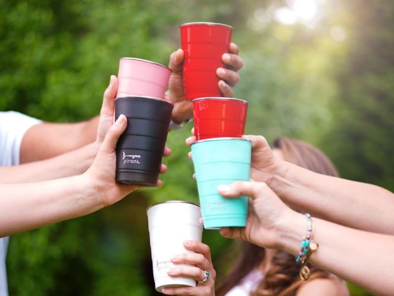 Pirani tumbler on a beach table illustrating travel-ready durability and style
