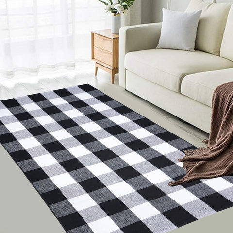 PIXFAIRY rug styled in entryway creating a welcoming focal point and dirt-trapping benefit