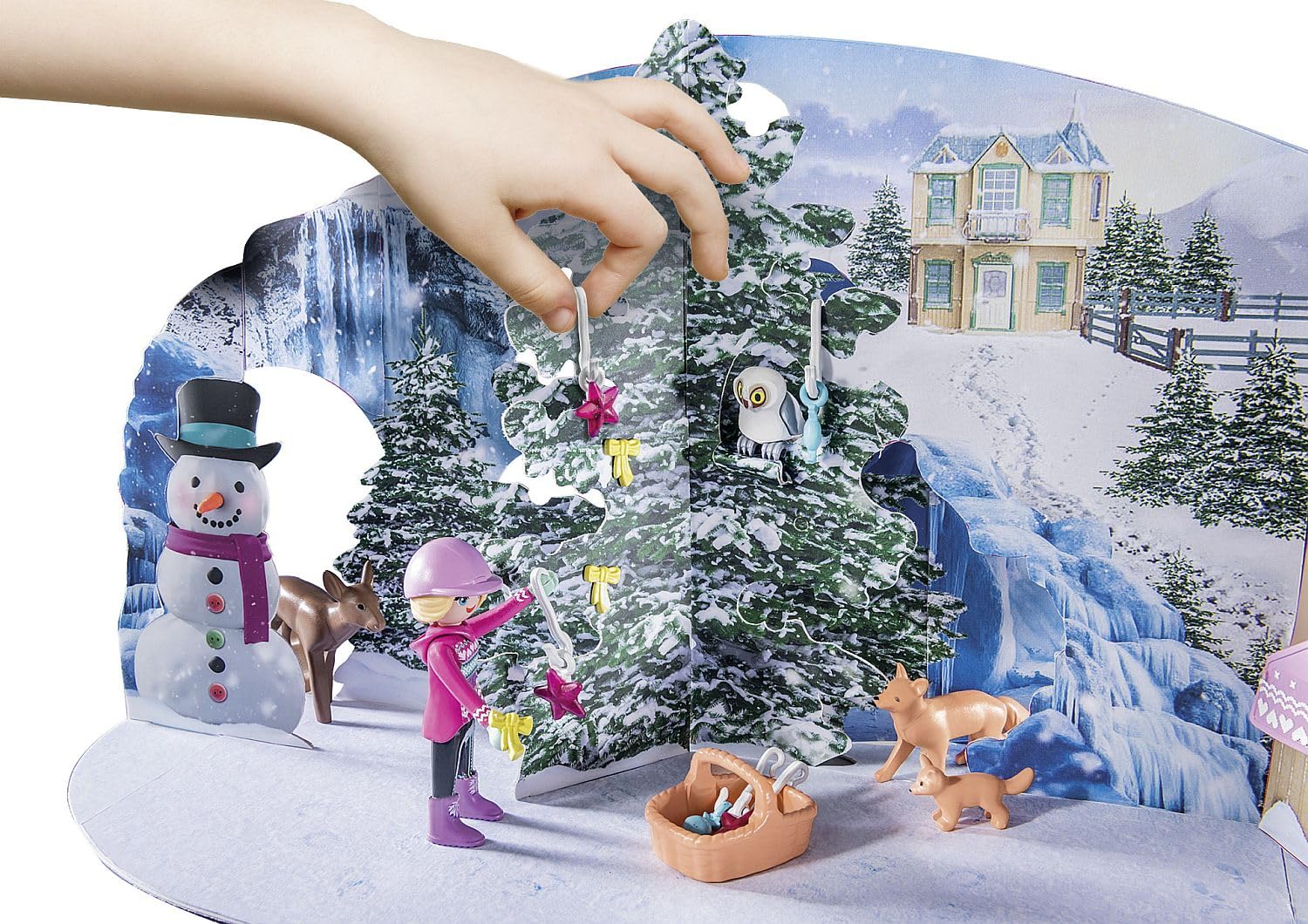 Playmobil forest animals and Lucy the dog staged in a winter lifestyle play scene
