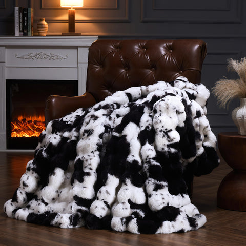 PLUUSHUU cow print front view showing plush pattern and stylish accent