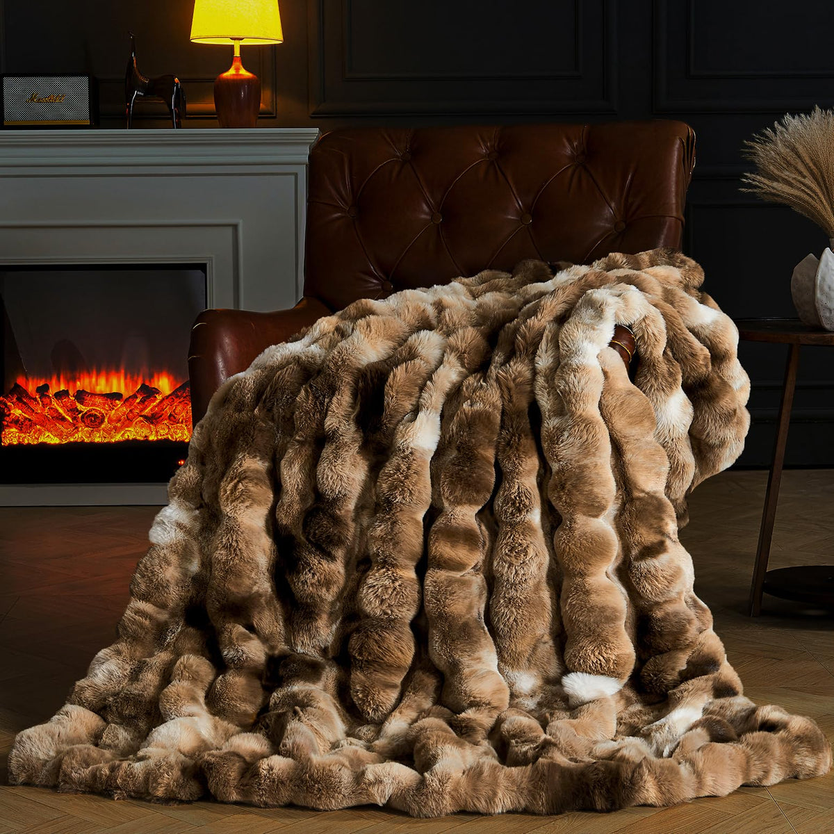 PLUUSHUU front packaging showing tie-dye brown blanket and luxury appeal