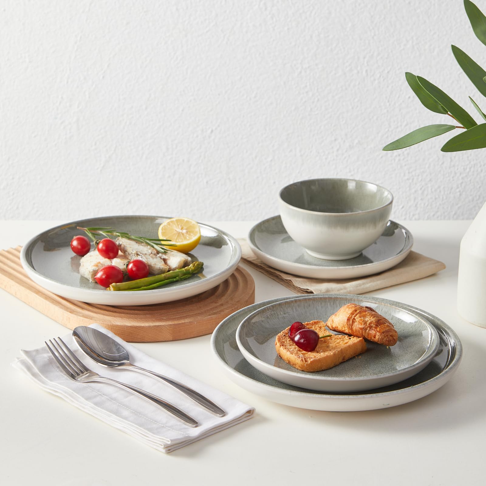 Pokini stoneware set styled on kitchen table conveying cohesive dining presentation
