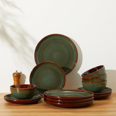 Pokini plate held in hand for size comparison showing practical scale