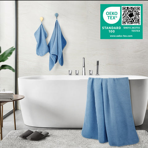 POLYTE person wrapping in bath towel demonstrating cozy comfort and quick drying