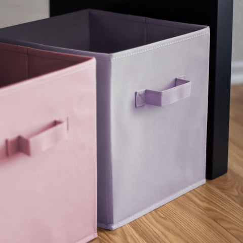 Pomatree bins styled in a playroom showing organized toys and cheerful decor