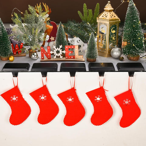 popamaz hanger in use on a fireplace mantel holding a full stocking securely