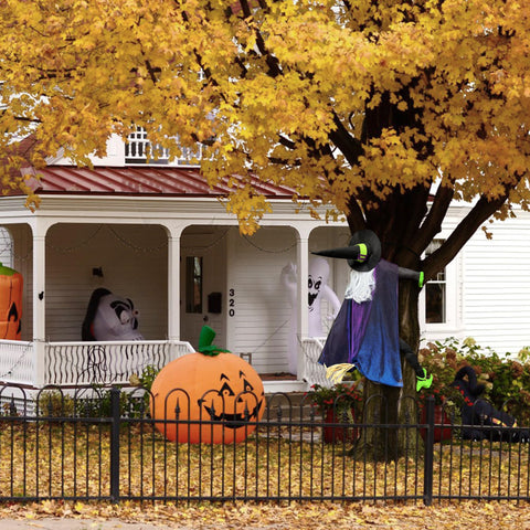 POPGIFTU witch on porch with pumpkins creating festive curb appeal