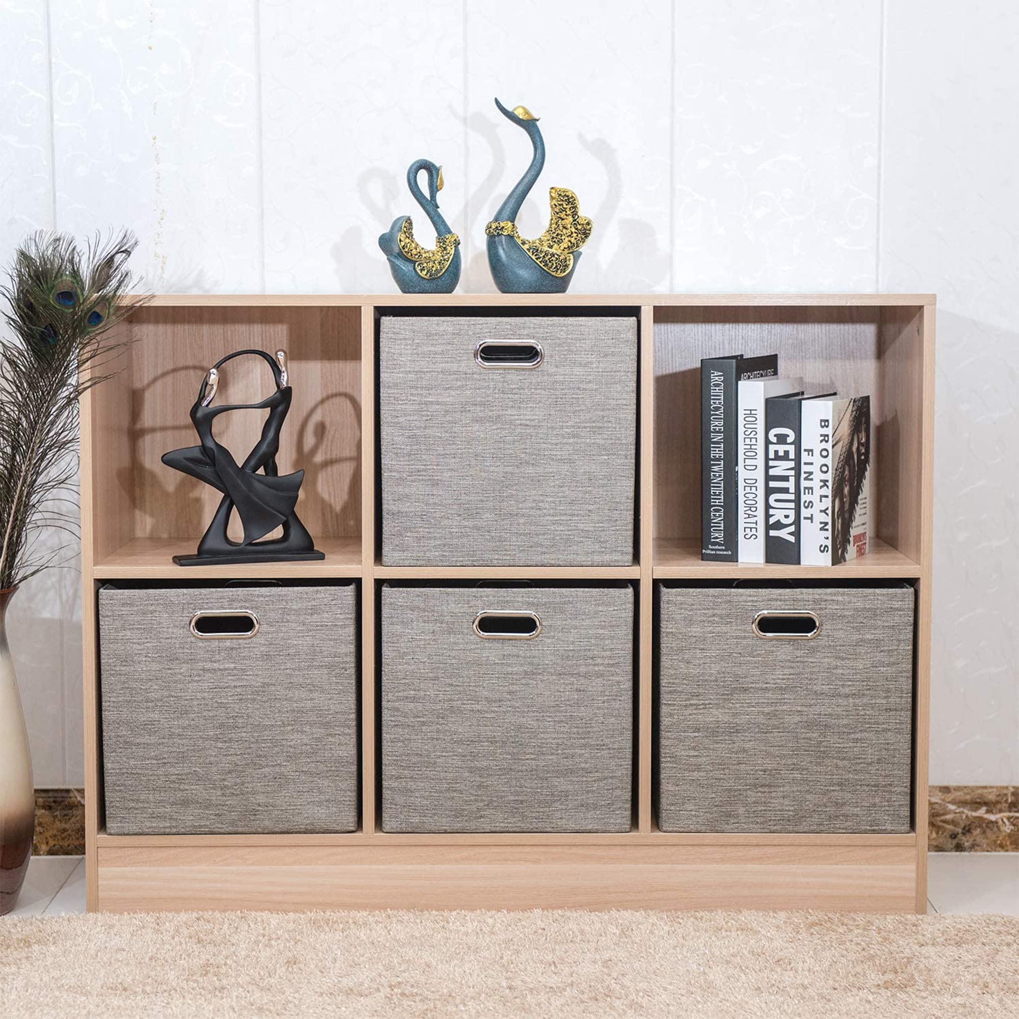 Posprica cube held by hand to show 13-inch scale and practical size