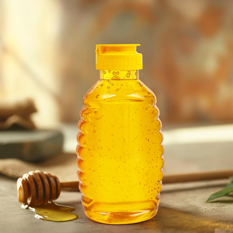 PPXHFV pouring honey over toast in kitchen scene showing neat drizzle control