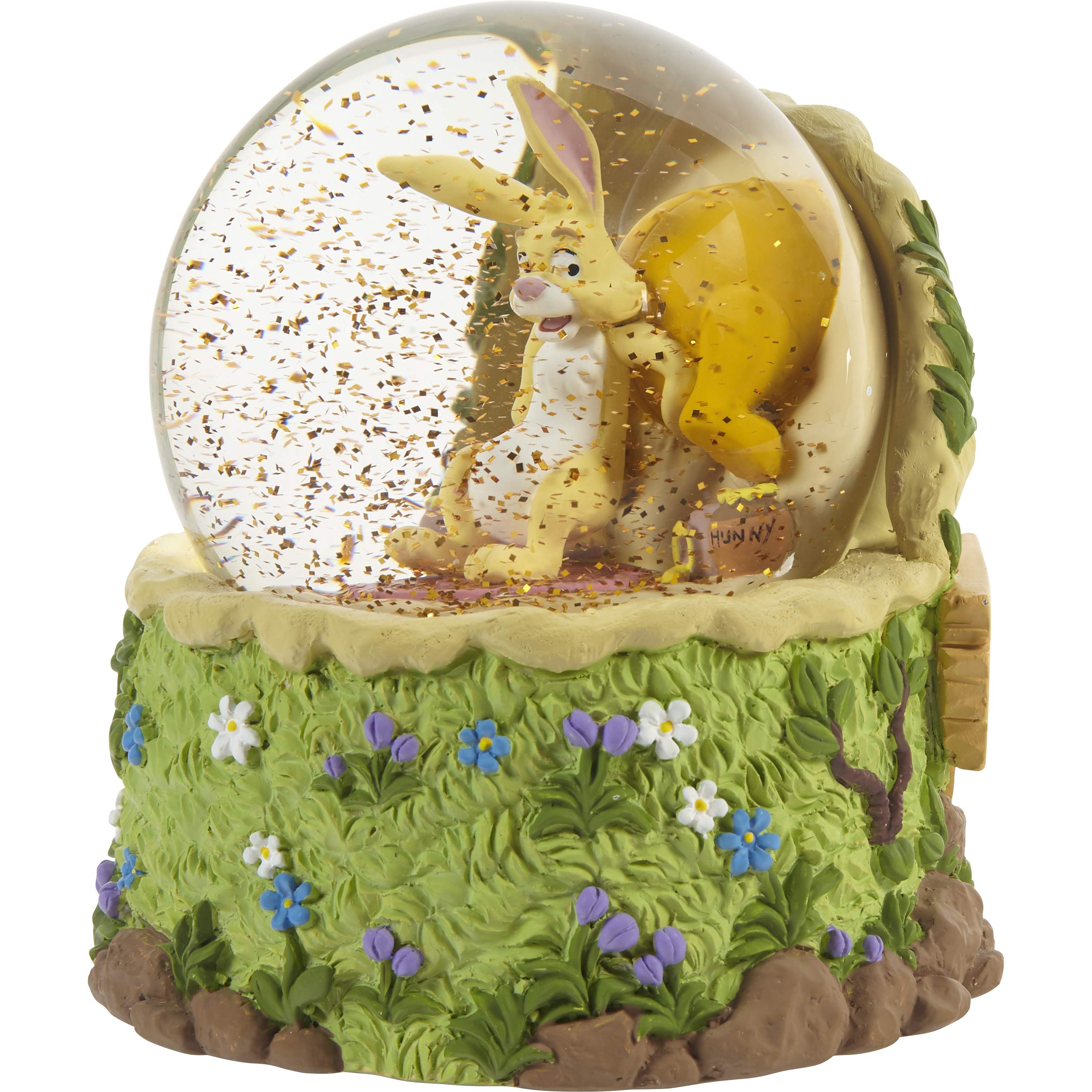 Precious Moments glass globe with honey-colored glitter demonstrating warm shimmer