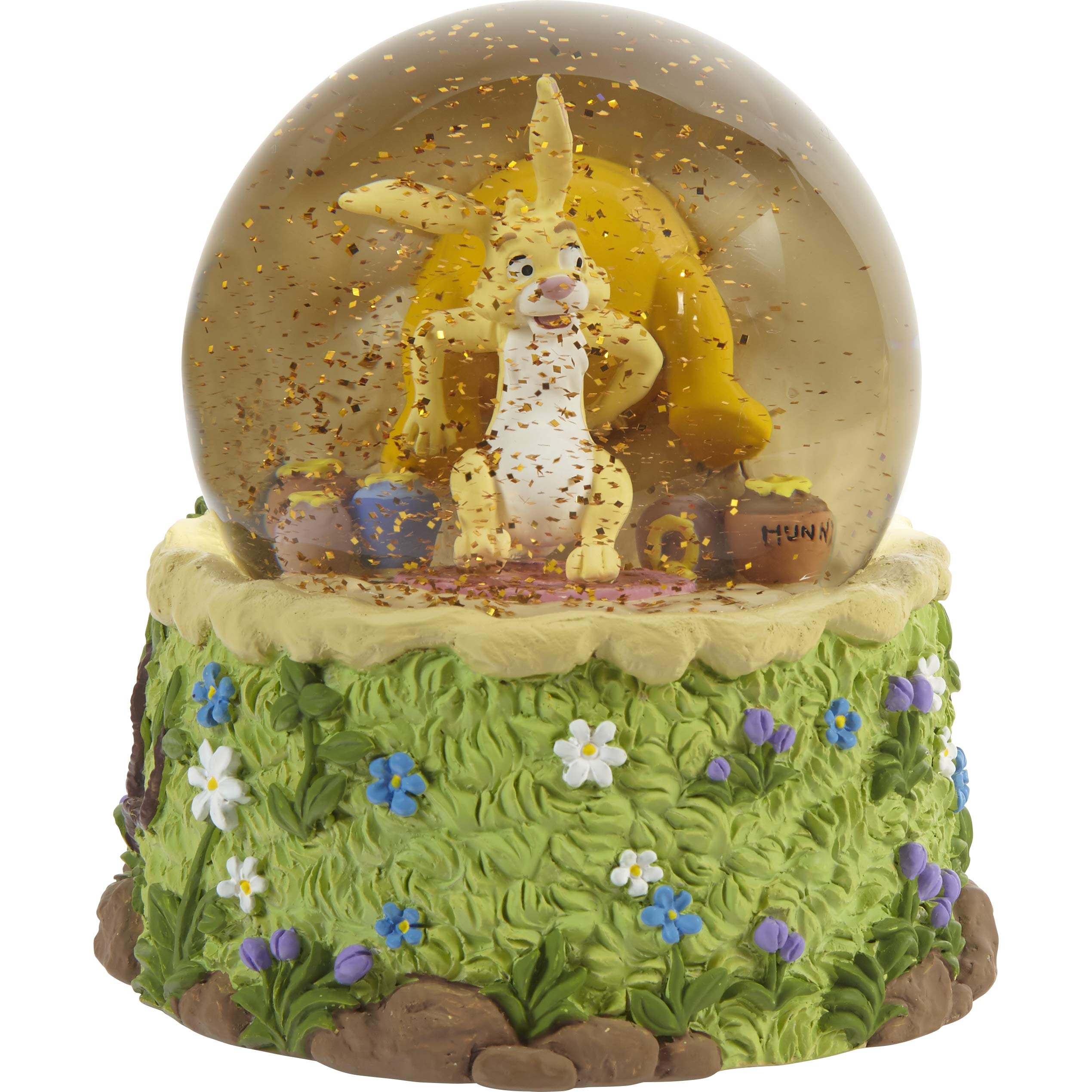 Precious Moments globe beside a coffee mug showing compact 5.5-inch scale
