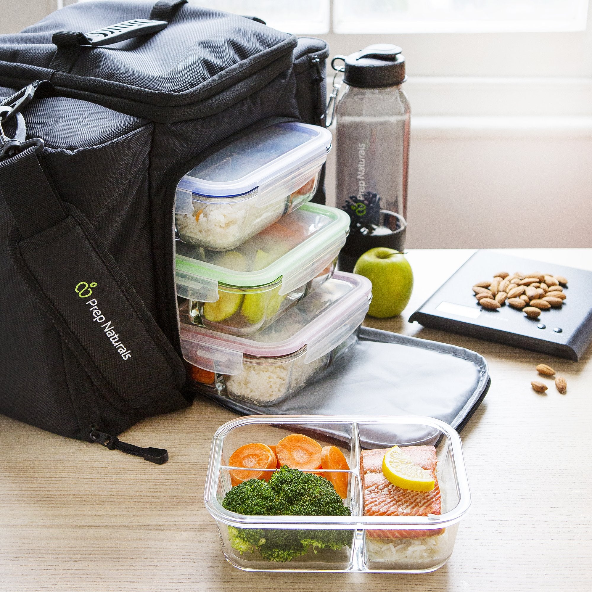 PrepNaturals container beside fork and knife showing 34oz capacity for full meals