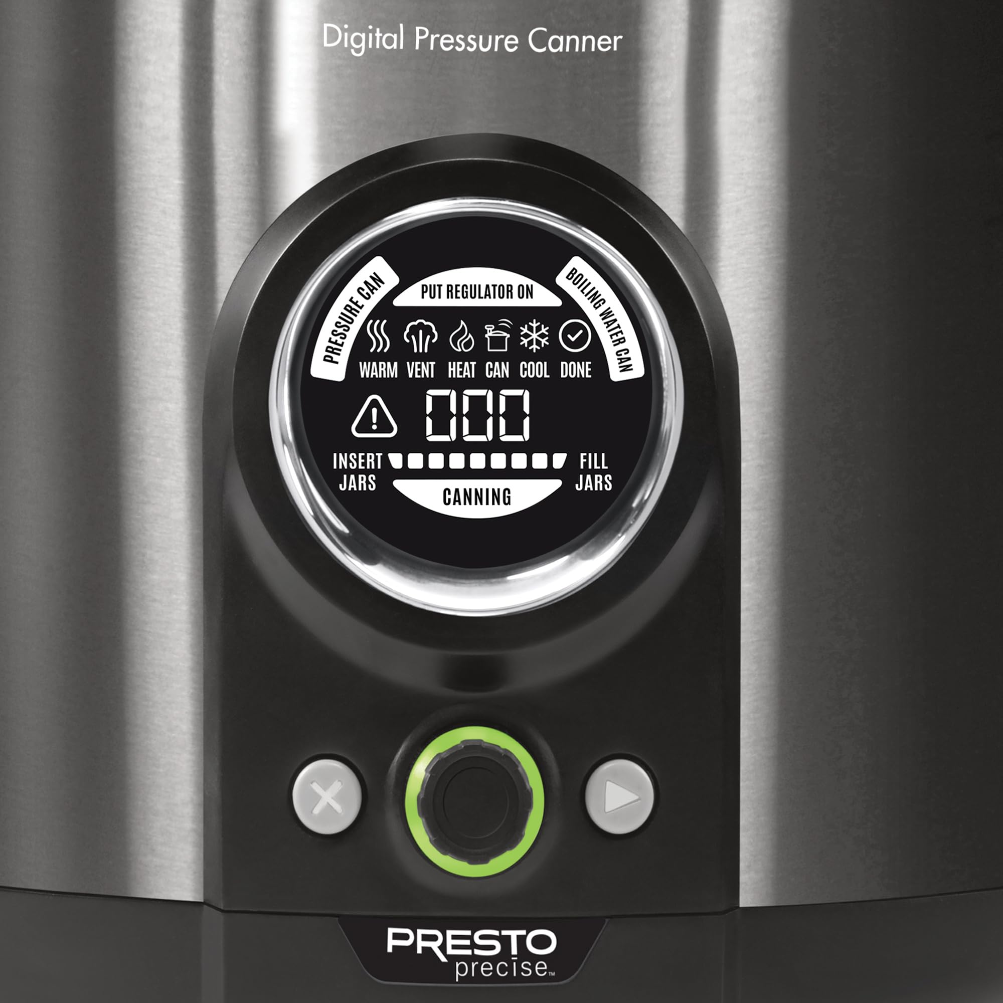 Presto canner beside a hand for scale, benefit: shows compact 12‑quart capacity