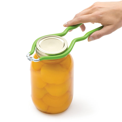 Presto jar lifter and tongs in use removing hot jar safely from canner
