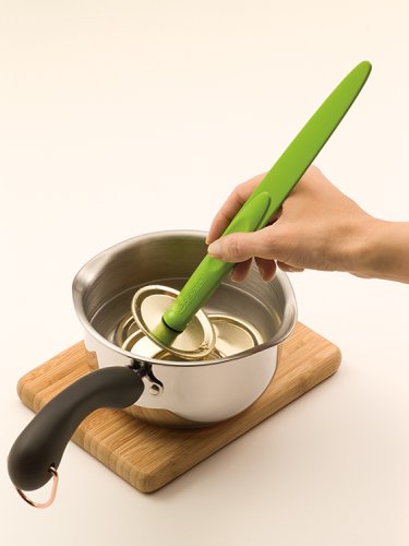 Presto jar wrench loosening a stuck screw band for easier opening