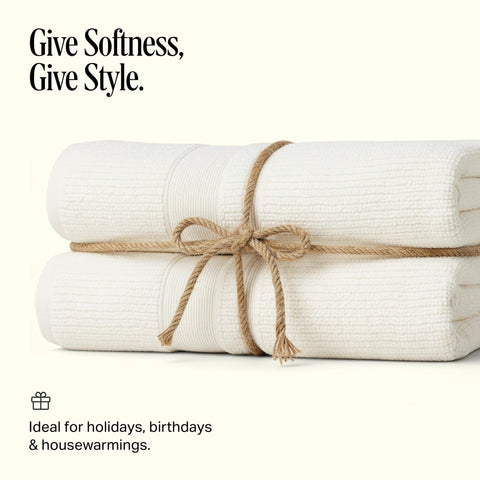 Preston Lane towel held by hand demonstrating 54.25 x 26.5 inch scale comfort