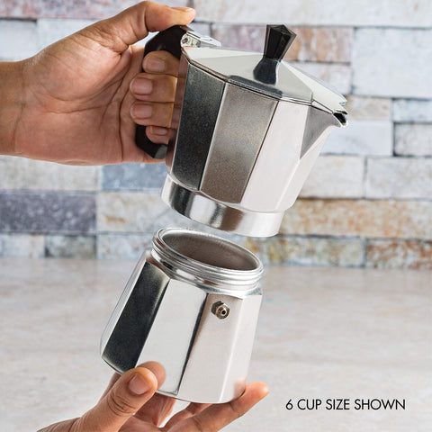 Primula espresso pouring action into cup illustrating rich crema and easy serving