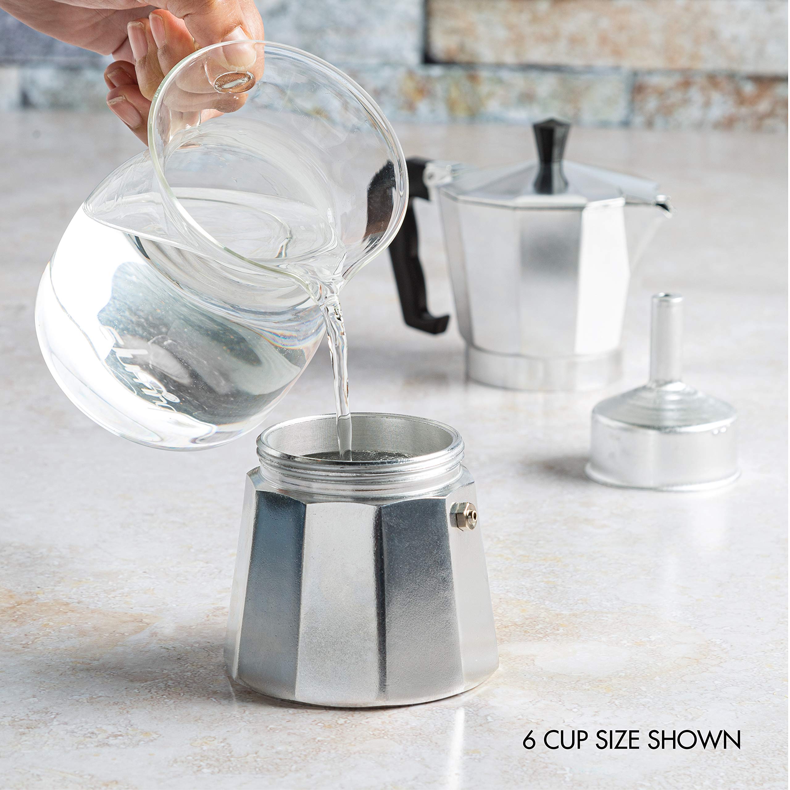 Primula on stovetop in use steaming espresso for fast camp or kitchen brewing