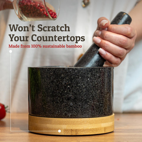 Priority Chef mortar in use mashing avocado to create chunky guacamole quickly