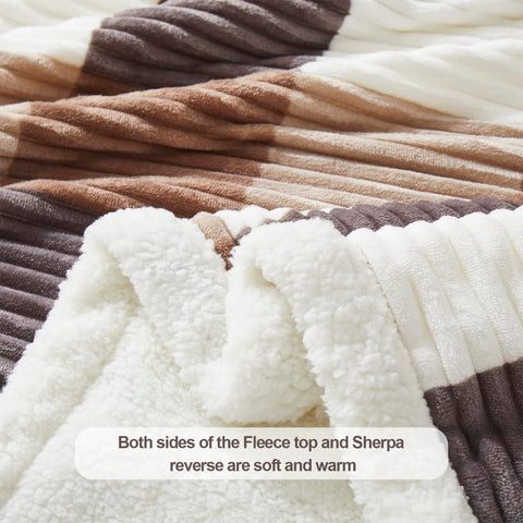 PU MEI folded blanket on bed showing twin-size scale and neat presentation