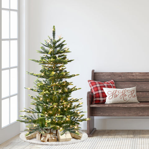 Puleo International decorated tree in living room creating festive visual focal point