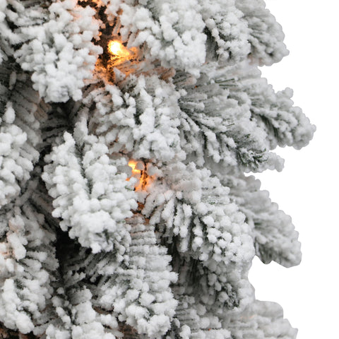 Puleo International close-up of snow-flocked needles highlighting realistic texture and charm