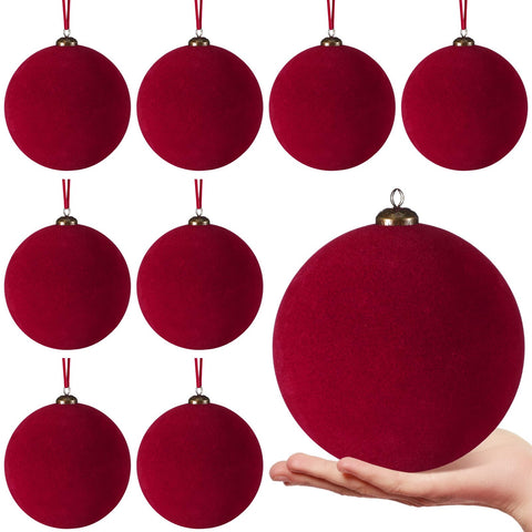PullCrease front view of eight wine red velvet balls, elegant holiday impact
