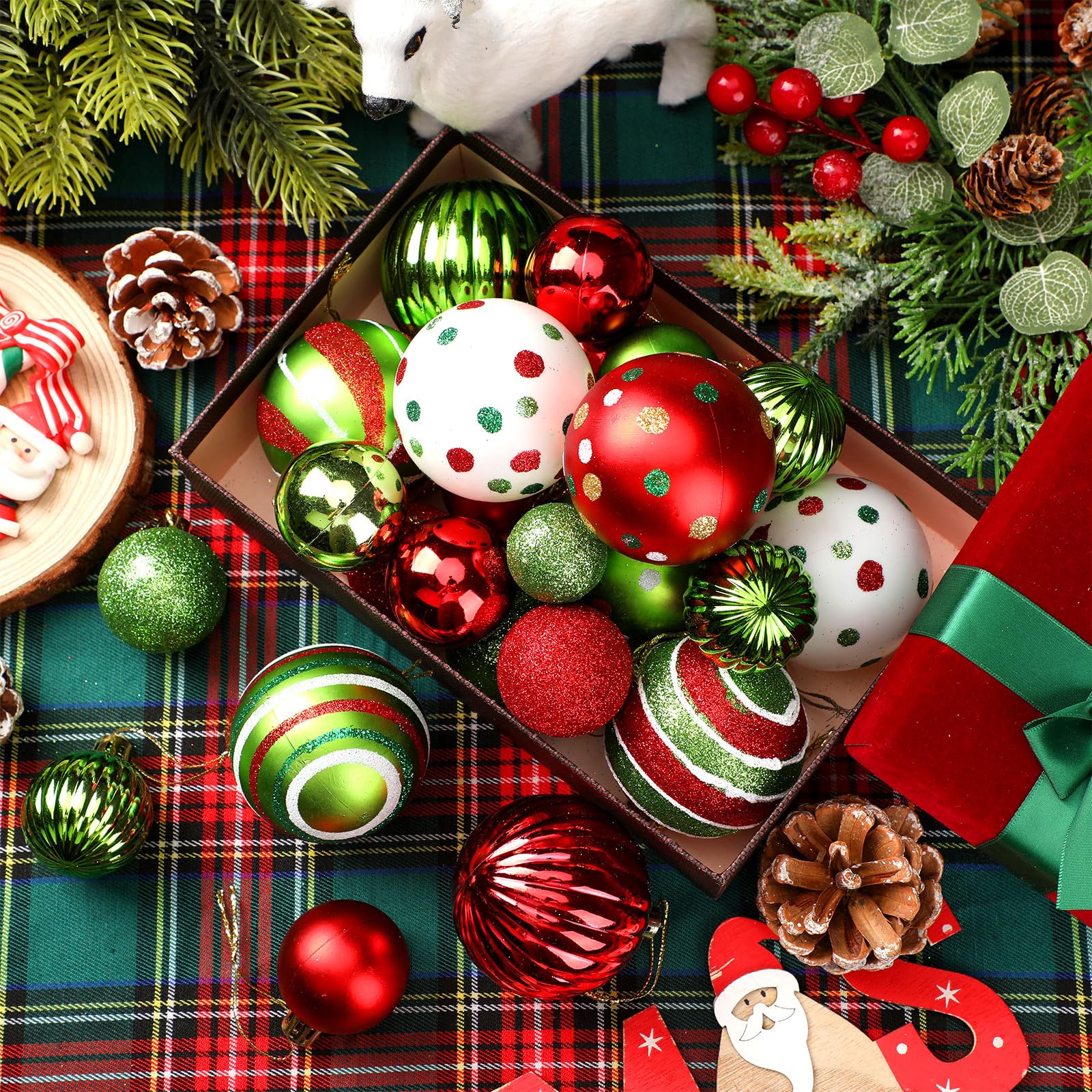 PullCrease ornaments hung on a living room tree adding cohesive festive color