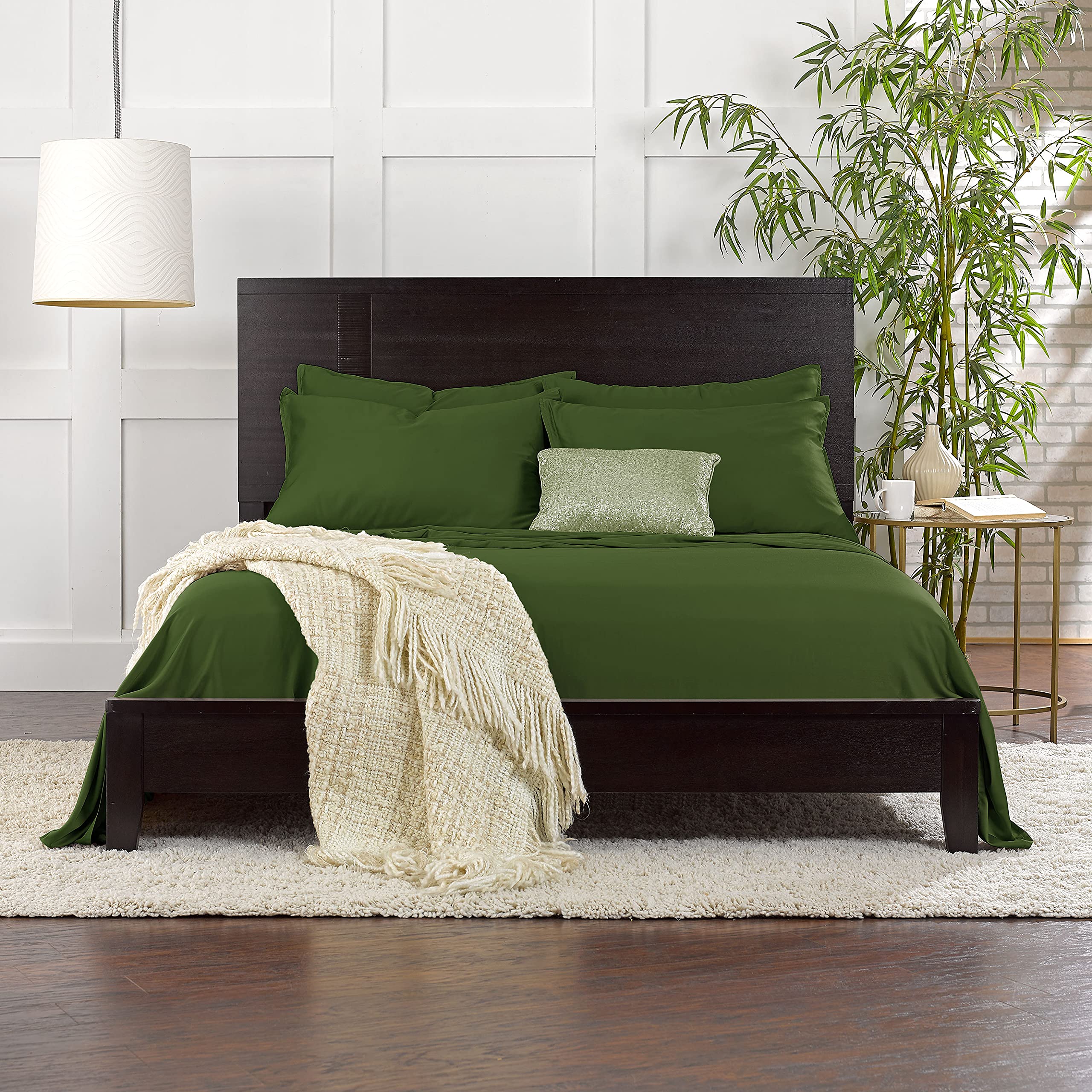 Pure Bamboo styled bedroom with pesto sheets showing restful aesthetic and cooling benefit