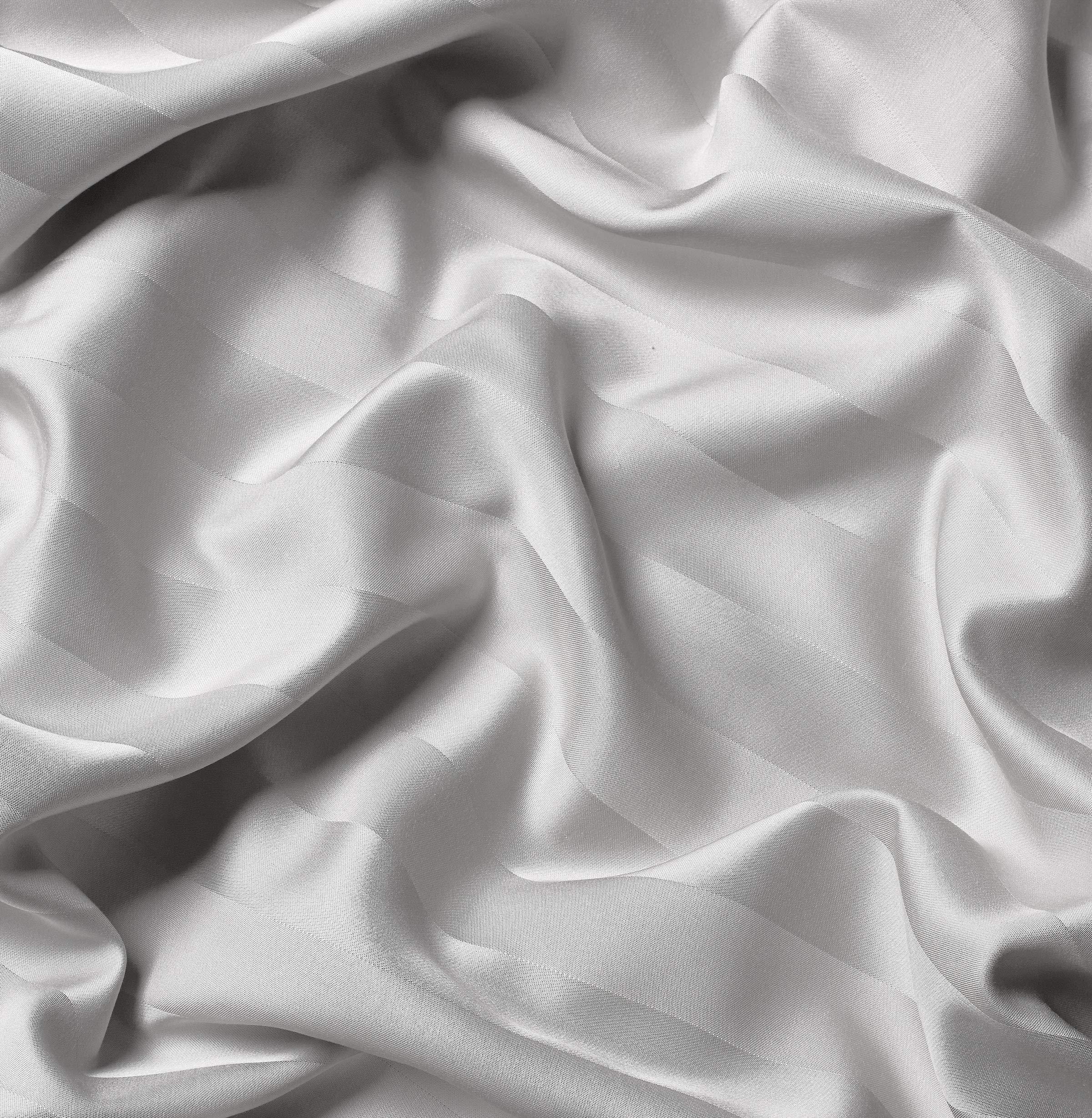 Pure Bamboo fabric softness tested by hand to emphasize silky feel