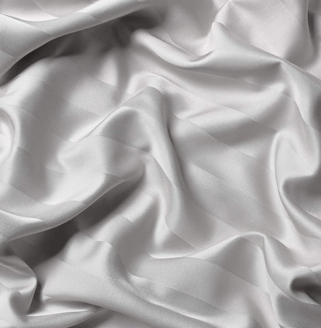 Pure Bamboo fabric softness tested by hand to emphasize silky feel