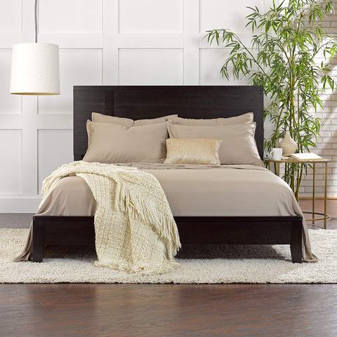 Pure Bamboo hand touching fabric texture demonstrating ultra-soft feel and quick moisture wicking