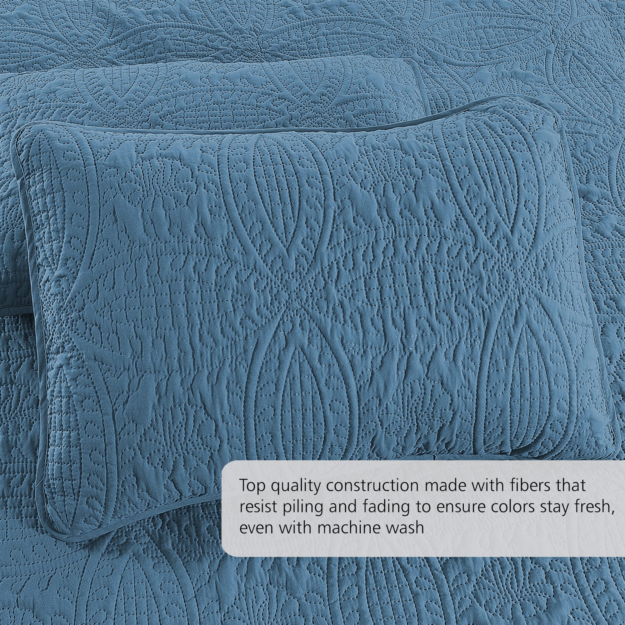 Pure Bedding quilt in a styled bedroom demonstrates versatile ash blue color and easy coordination with decor