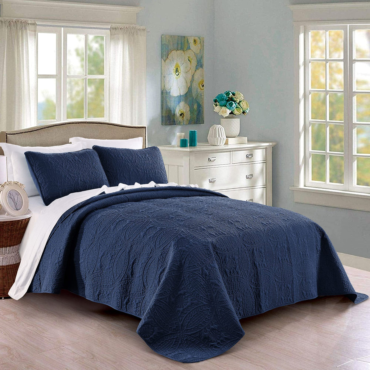 Pure Bedding quilt front view navy showing geometric pattern and polished finish benefit