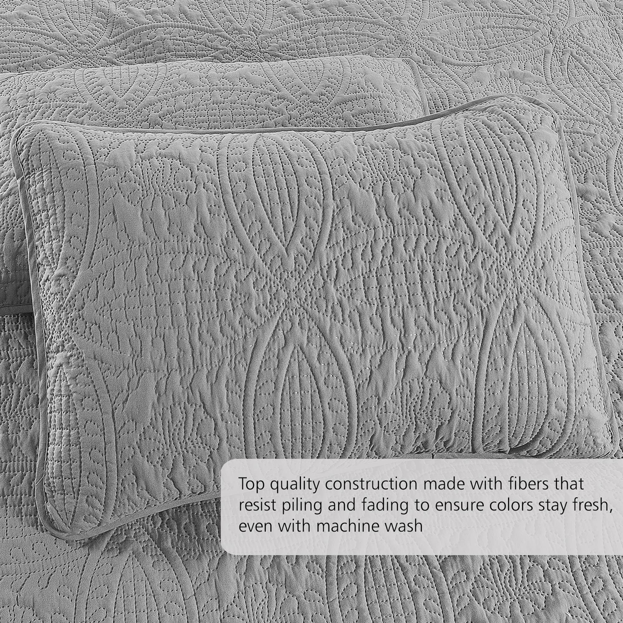 Pure Bedding shams detail with matching geometric quilt pattern and neat seams for coordinated look